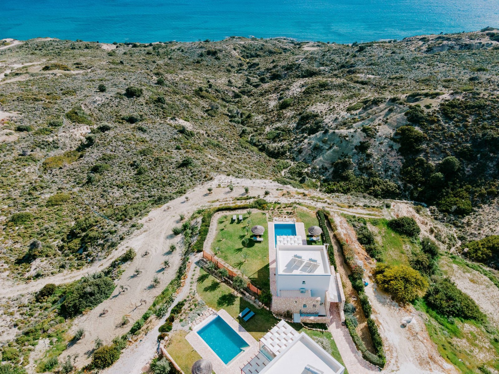 Villa surrounded by nature, seen from the air