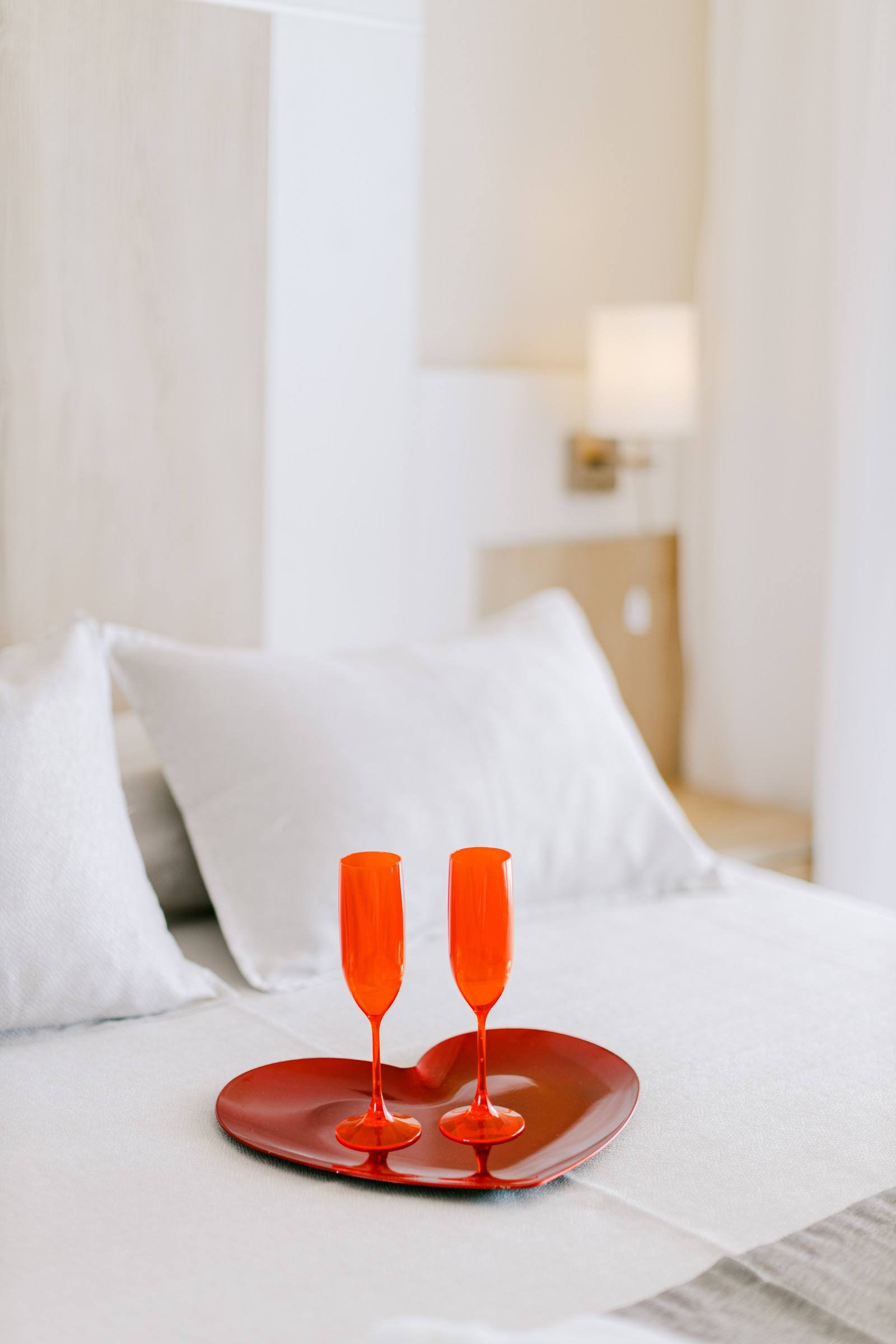 Welcome glasses on the bed