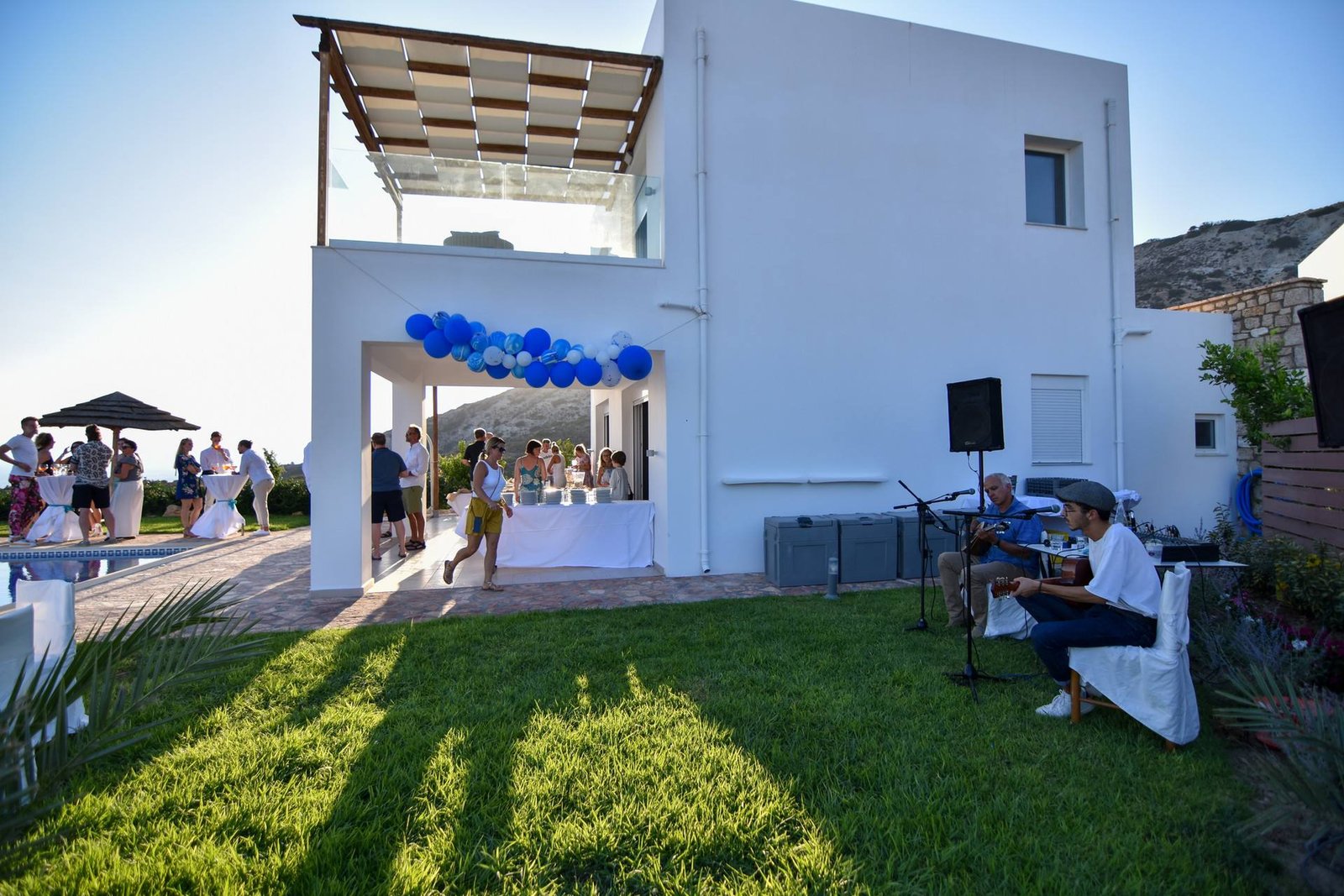 Evening celebration with live music beside the villa