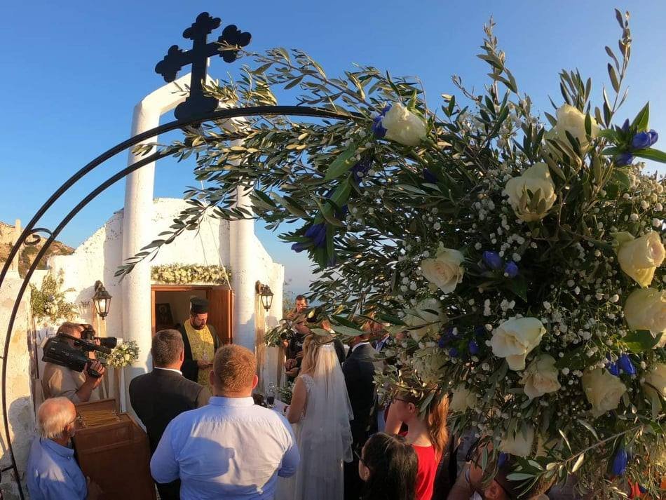 Wedding ceremony at the white chapel next to the villas